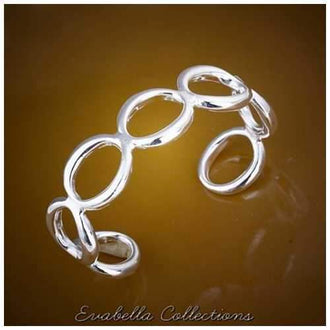 XO Cuff Style Bracelets polished in Silver