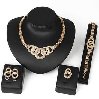 Vintage Rhinestone Annulus Necklace Bracelet Ring and Earrings Set - Golden