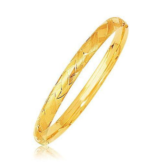 14k Yellow Gold Domed Bangle with a Weave Motif, size 7''