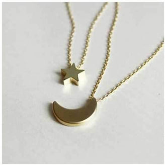 Golden Moon and Star Charms on a Layered Chain Necklace