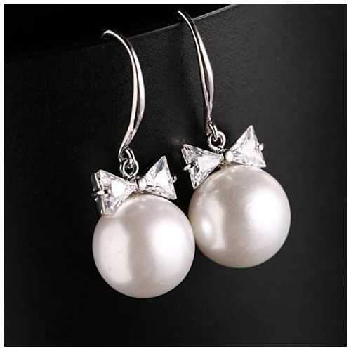 DIAMONDS AND PEARLS - Platinum Polished BOW Earrings