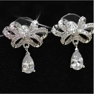 Celebration Earrings Big Bow And Pear Cut Crystal In Silver Polish