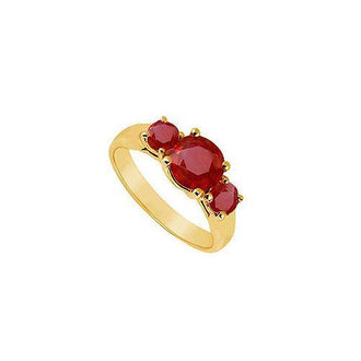 Three Stone Ruby Ring : 14K Yellow Gold - 0.75 CT TGW