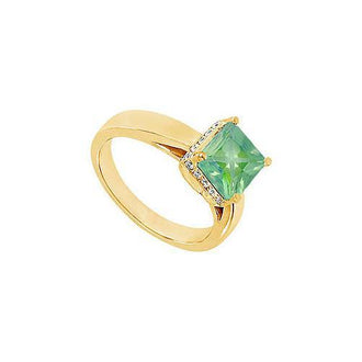 Emerald and Diamond Ring : 14K Yellow Gold - 1.00 CT TGW