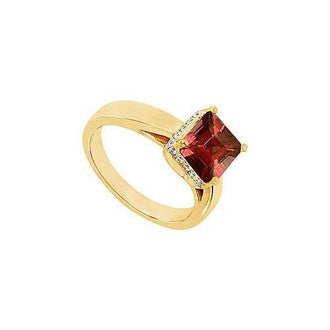 Garnet and Diamond Ring : 14K Yellow Gold - 0.83 CT TGW